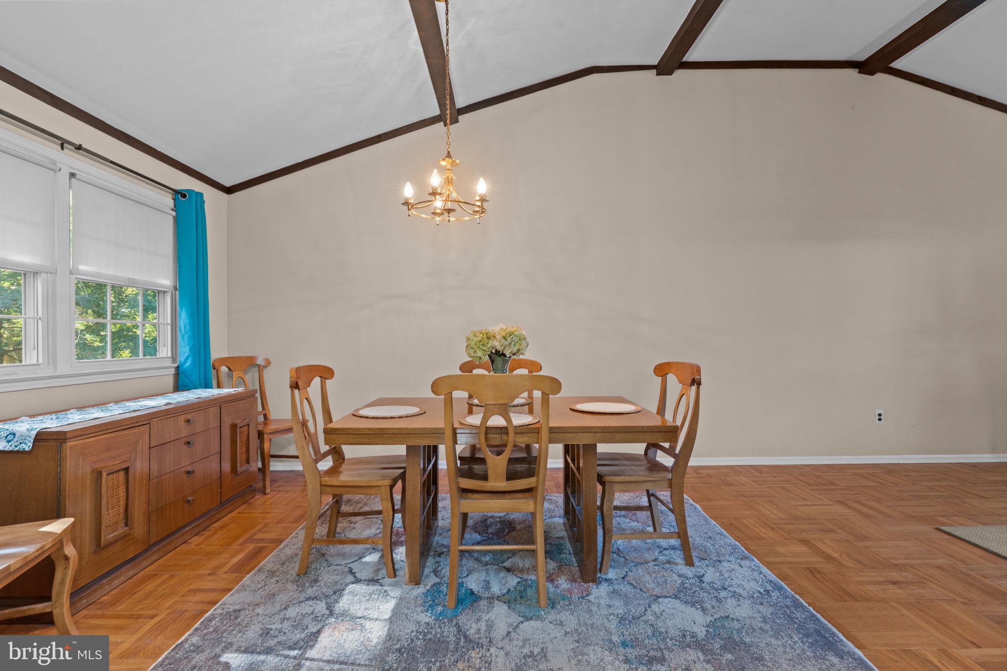 17 Highland Drive Yardley, PA 19067 - Photo 5 of 29 a view of a dining room with furniture a chandelier and wooden floor