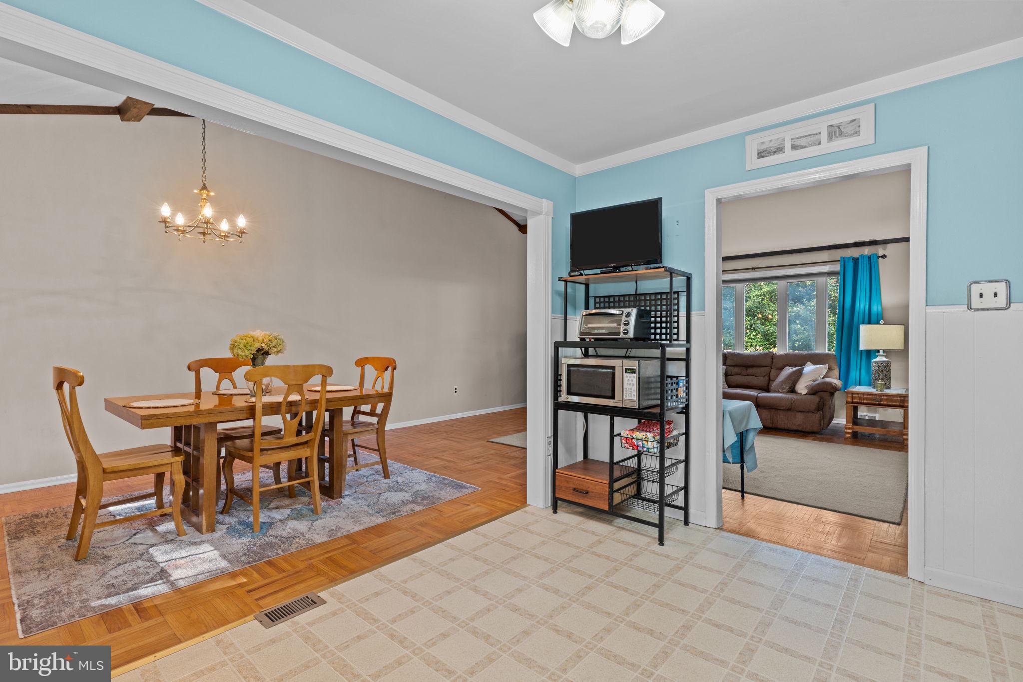 17 Highland Drive Yardley, PA 19067 - Photo 9 of 29 a dining room with furniture and chandelier