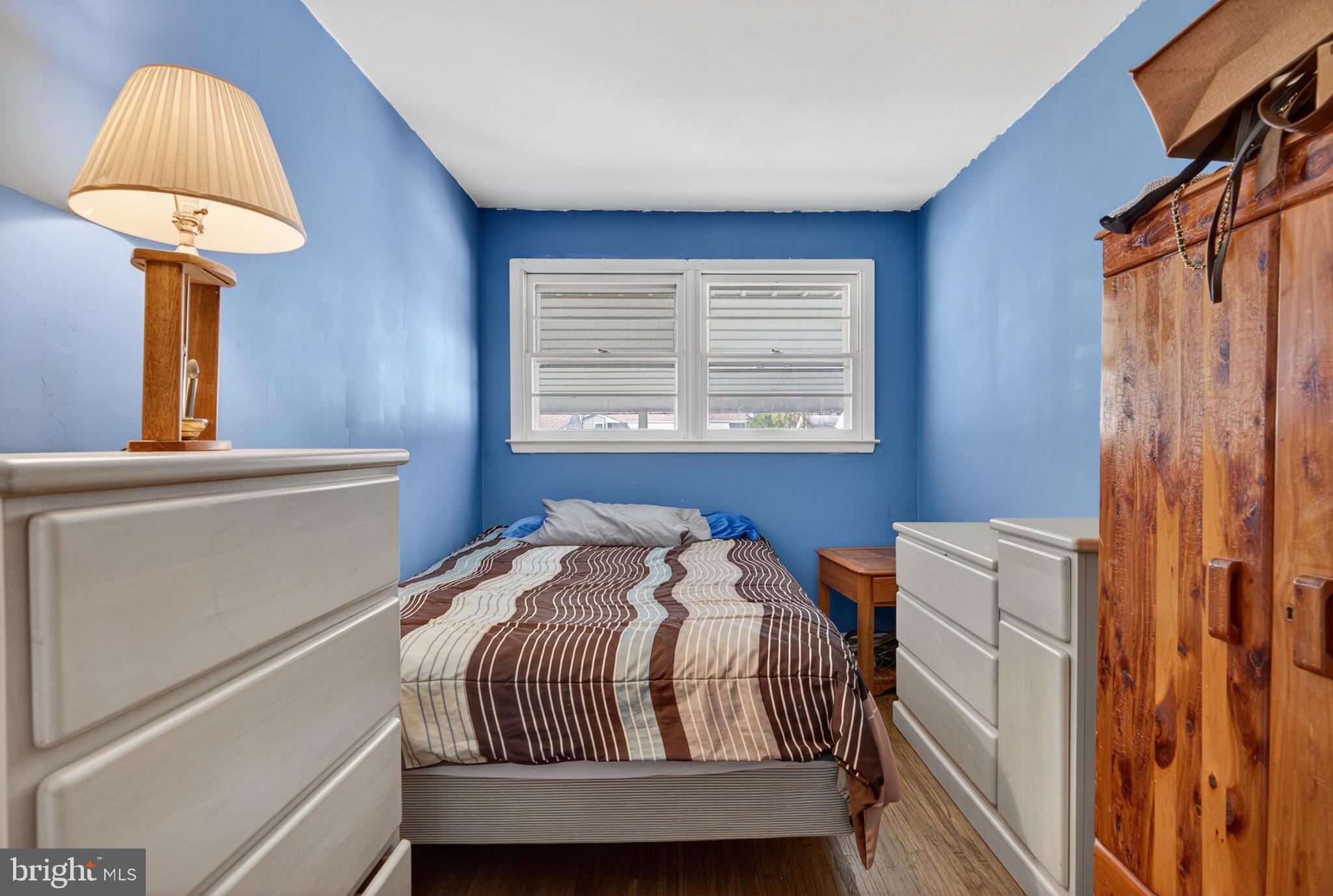 505 Monroe Street Riverside, NJ 08075 - Photo 18 of 35 a bedroom with a bed and a window