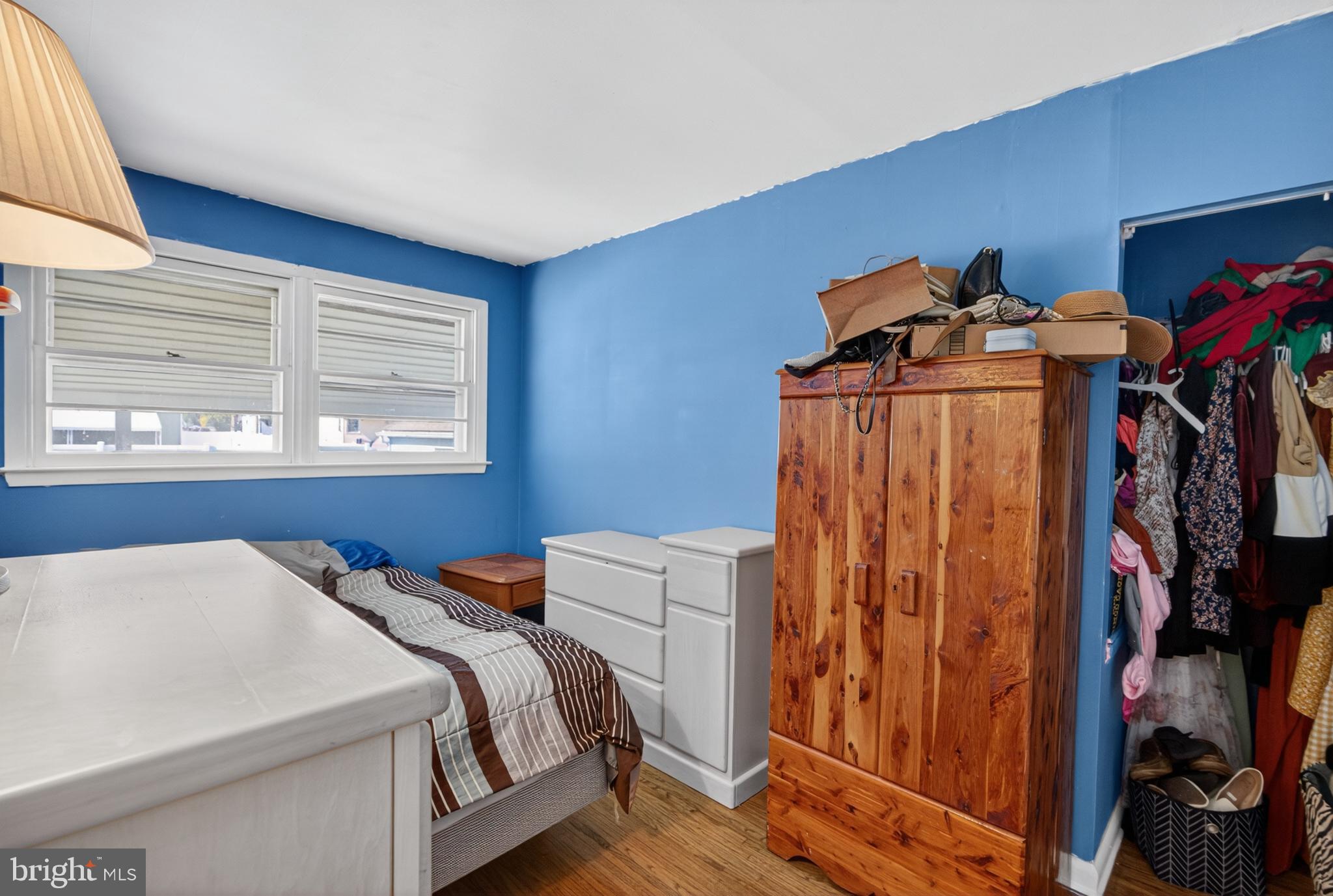 505 Monroe Street Riverside, NJ 08075 - Photo 19 of 35 a bedroom with a bed and a window