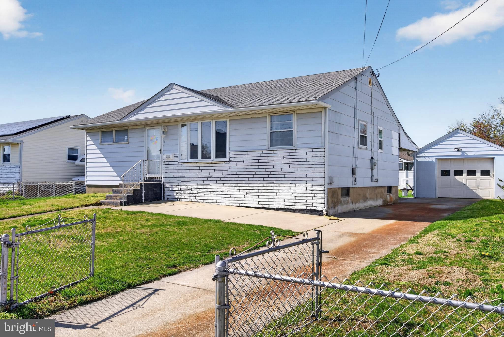 505 Monroe Street Riverside, NJ 08075 - Photo 2 of 35 a front view of a house with garden