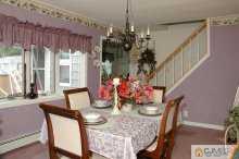 138 Ridge Road Colonia, NJ 07067 - Photo 3 of 8 a view of a dining room with furniture and window