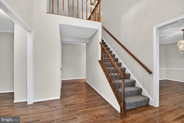 a view of entryway with wooden floor