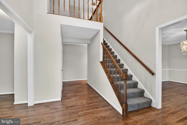 a view of entryway with wooden floor