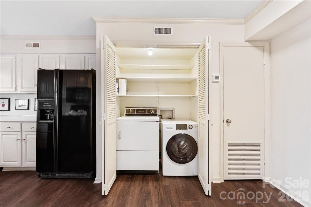 3500 Colony Road, Unit J Charlotte, NC 28211 - Photo 16 of 42 a utility room with dryer and washer