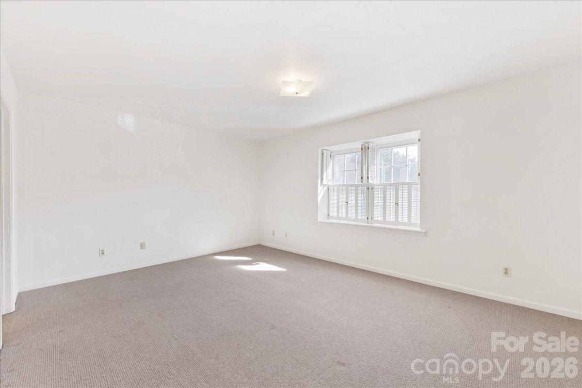 3500 Colony Road, Unit J Charlotte, NC 28211 - Photo 26 of 42 an empty room with windows
