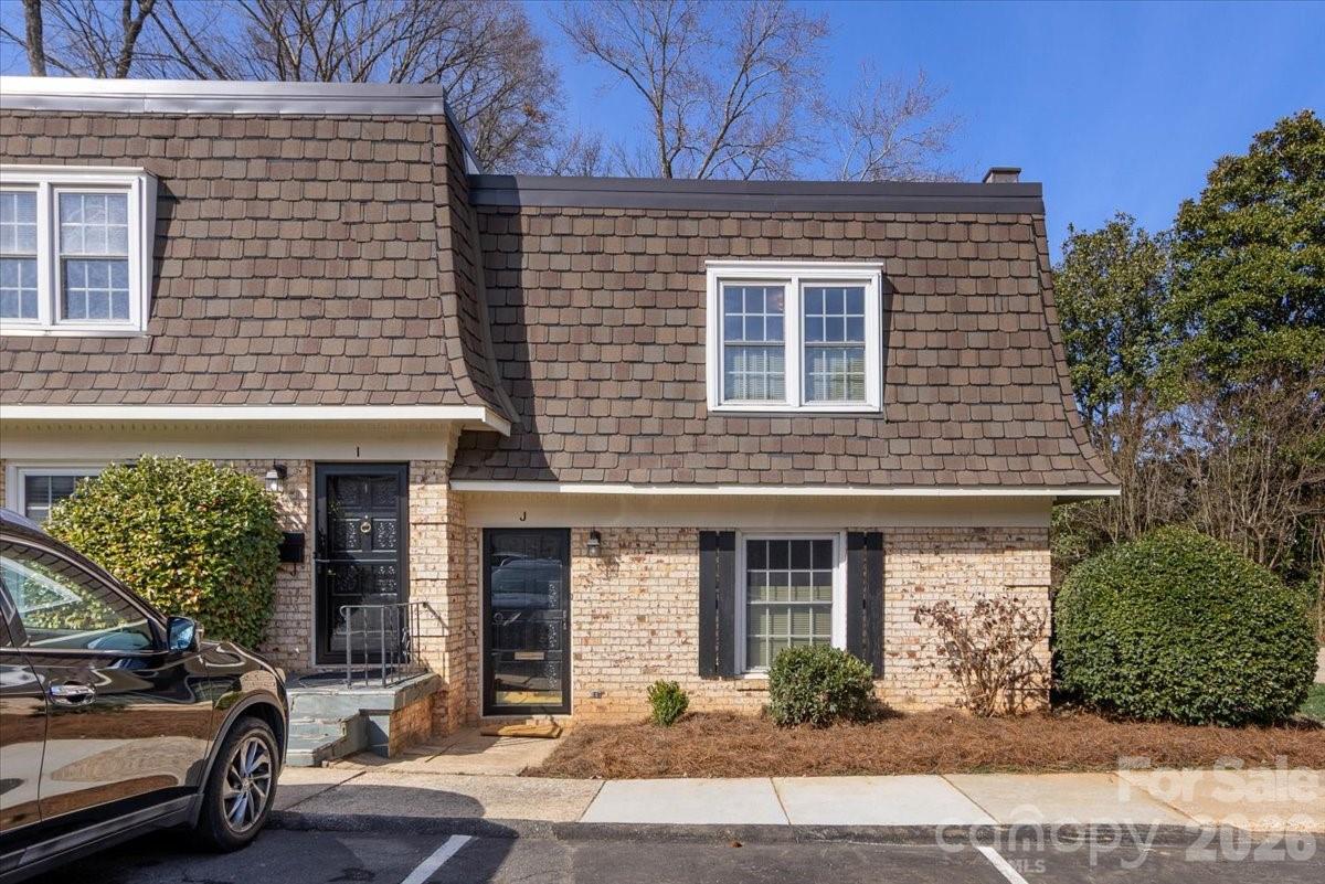 3500 Colony Road, Unit J Charlotte, NC 28211 - Photo 3 of 42 a view of a car parked in front of a building