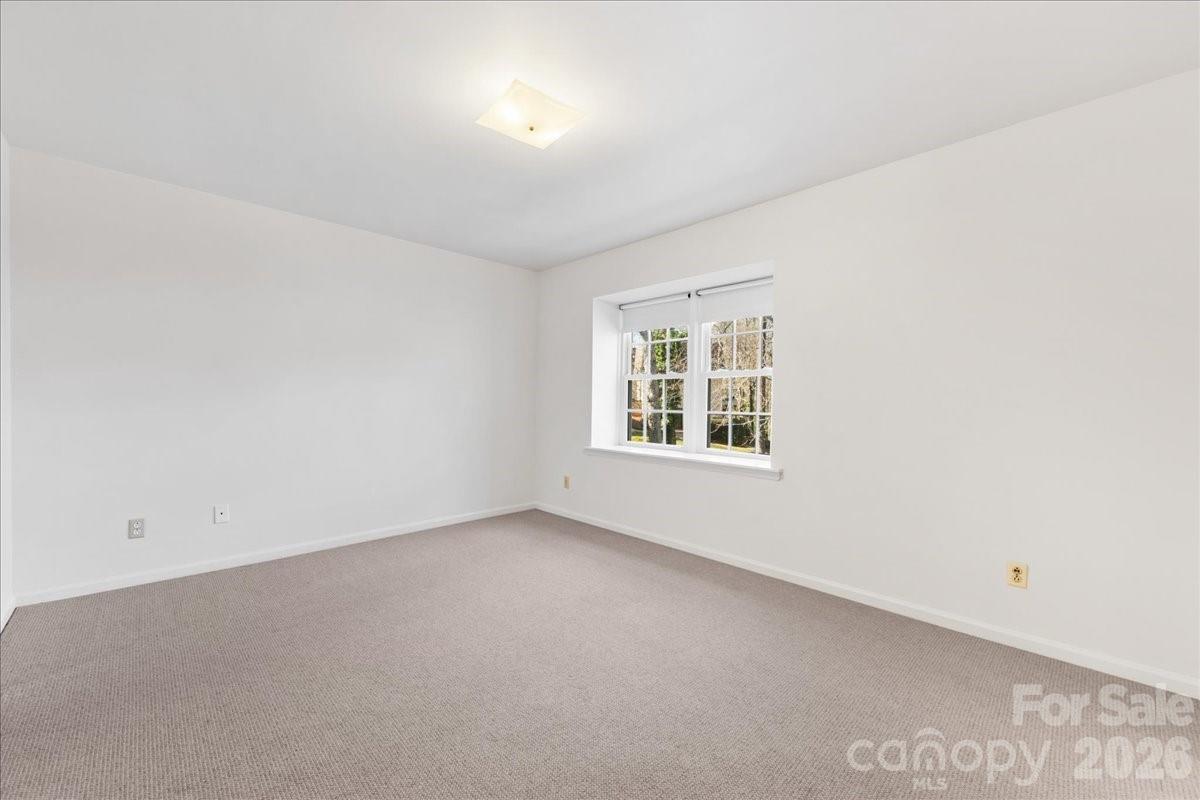 3500 Colony Road, Unit J Charlotte, NC 28211 - Photo 35 of 42 an empty room with a window