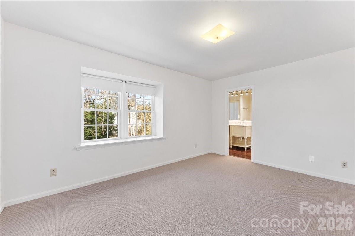 3500 Colony Road, Unit J Charlotte, NC 28211 - Photo 36 of 42 an empty room with windows