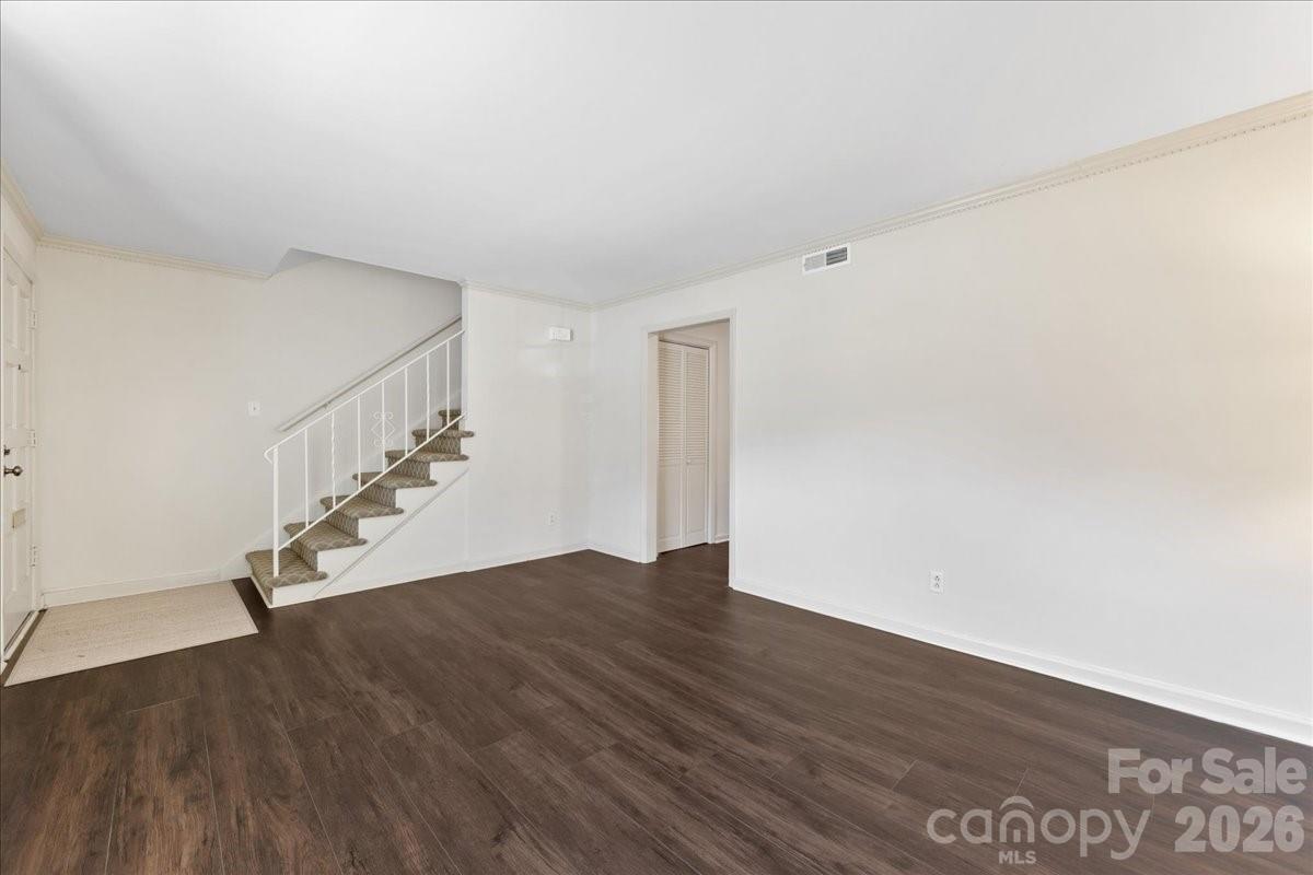 3500 Colony Road, Unit J Charlotte, NC 28211 - Photo 8 of 42 a view of entryway with wooden floor