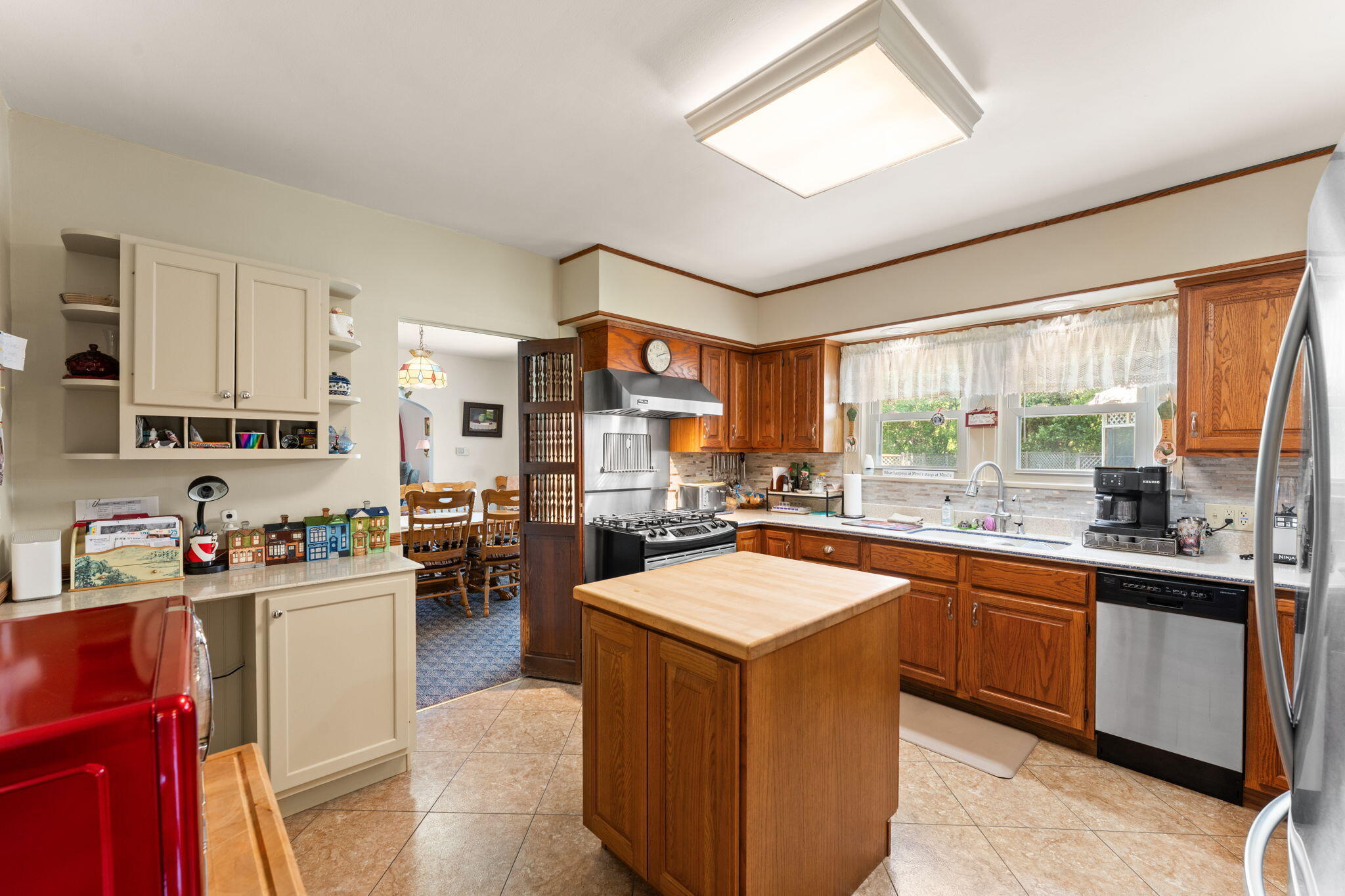 138 McClung Road La Porte, IN 46350 - Photo 8 of 50 a kitchen with a sink stove and cabinets