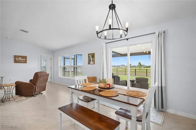 a work room with furniture and window