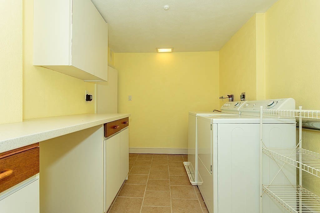 39 Beverly Road Arlington, MA 02474 - Photo 30 of 37 a bathroom with a sink mirror and toilet
