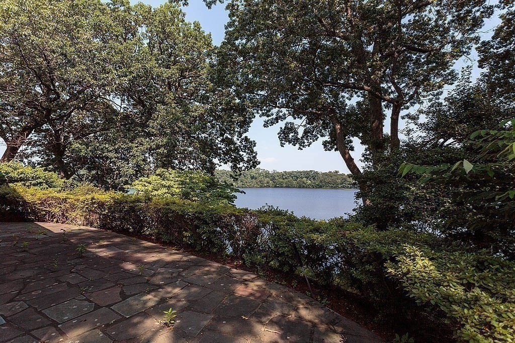 39 Beverly Road Arlington, MA 02474 - Photo 32 of 37 a view of a lake from a yard