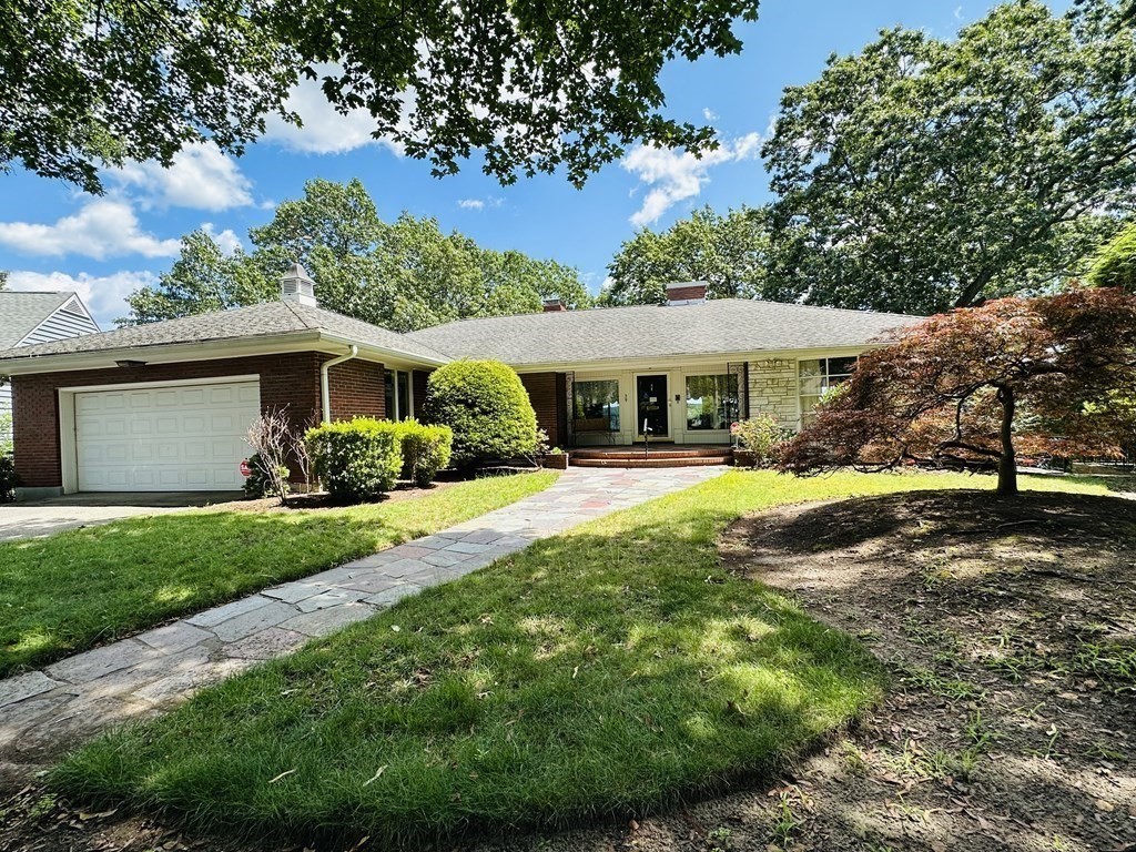 39 Beverly Road Arlington, MA 02474 - Photo 37 of 37 a view of a house with a swimming pool
