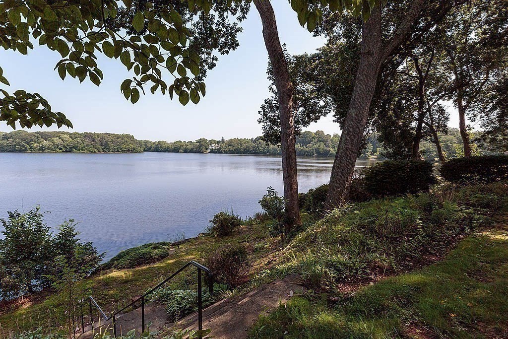 39 Beverly Road Arlington, MA 02474 - Photo 4 of 37 a view of a lake with a mountain