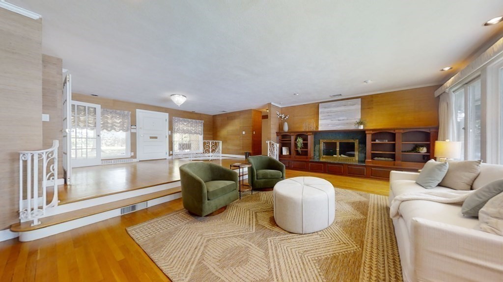 39 Beverly Road Arlington, MA 02474 - Photo 5 of 37 a living room with furniture and a large window