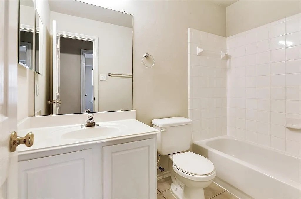 2 Peach Ridge Place The Woodlands, TX 77382 - Photo 16 of 29 a bathroom with a sink toilet and shower
