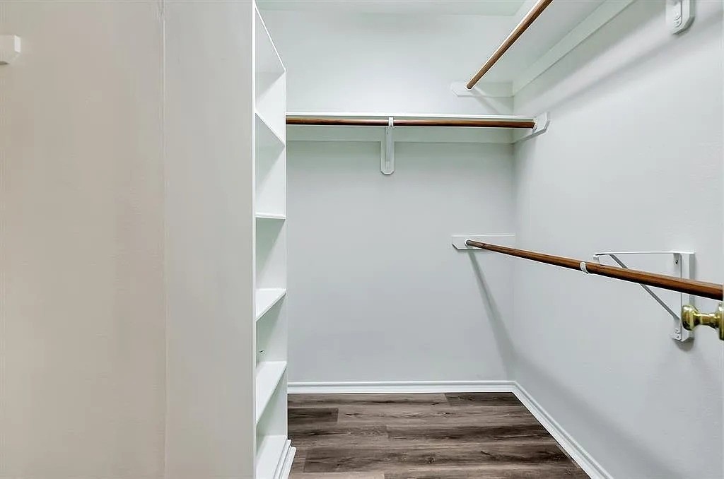 2 Peach Ridge Place The Woodlands, TX 77382 - Photo 23 of 29 a view of staircase with white walls