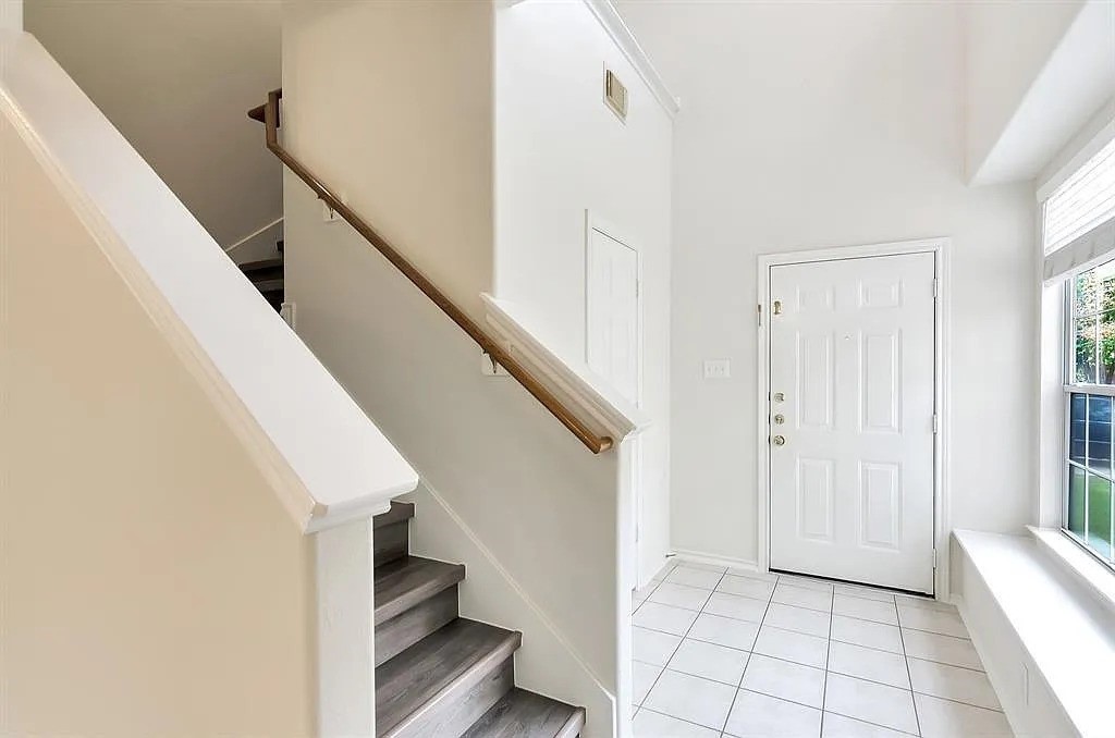 2 Peach Ridge Place The Woodlands, TX 77382 - Photo 6 of 29 a view of entryway and hall with wooden floor