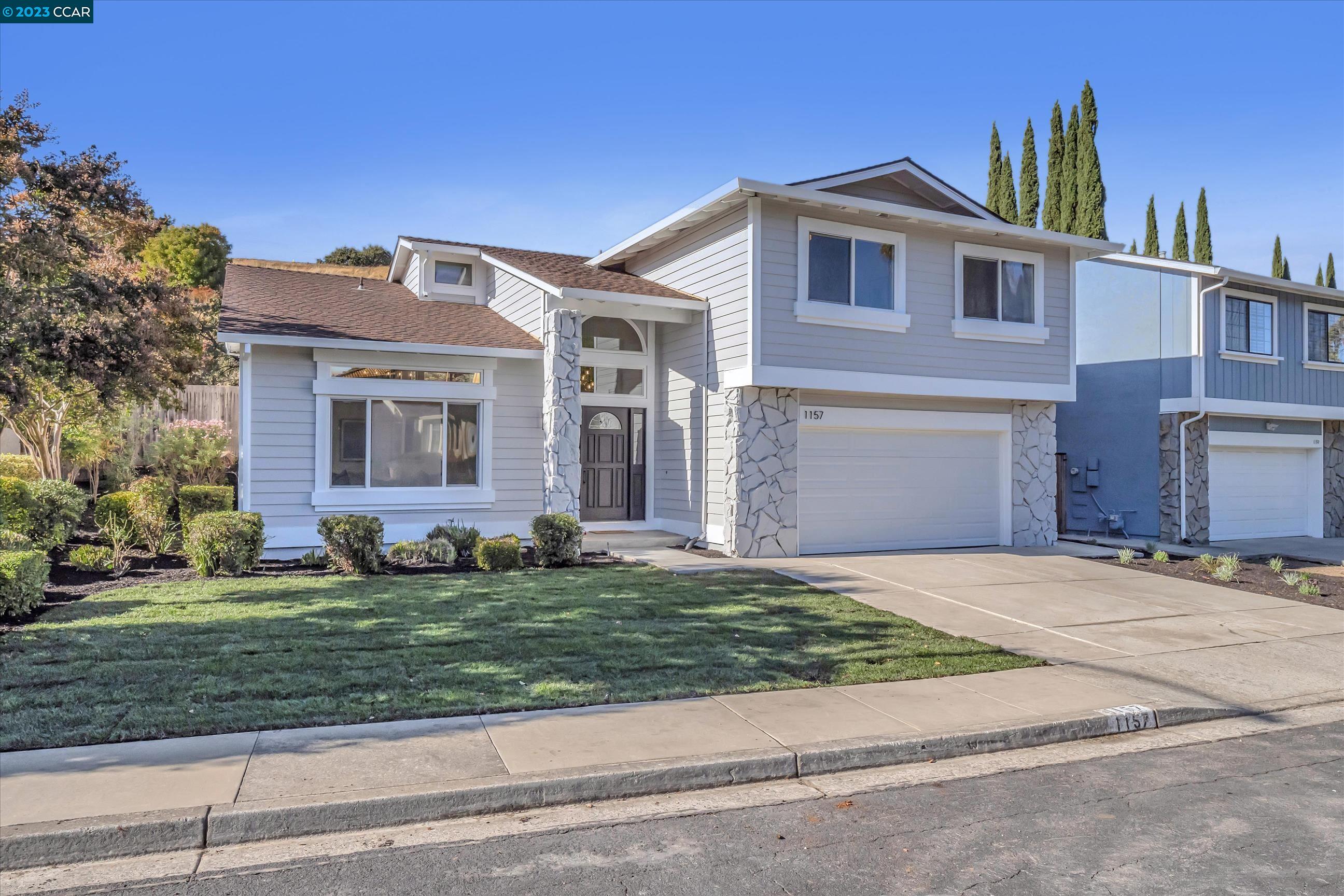 1157 Discovery Way Concord, CA 94521 - Photo 1 of 1 a front view of a house with a yard