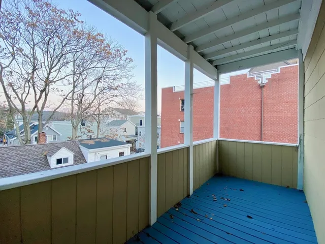 a room with trees and wooden floors