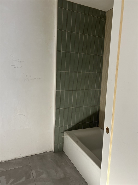 34 West Street, Unit B Newton, MA 02458 - Photo 11 of 17 a bathroom with a tub