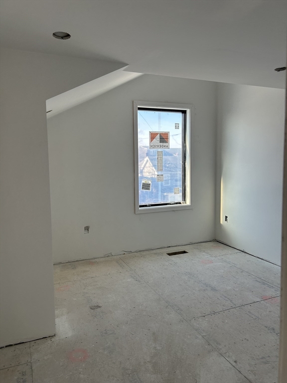 34 West Street, Unit B Newton, MA 02458 - Photo 14 of 17 a view of an empty room with a window