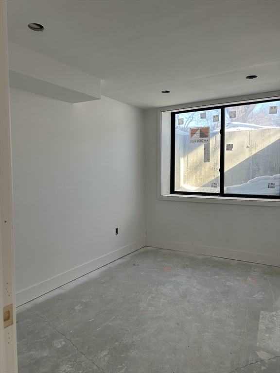 34 West Street, Unit B Newton, MA 02458 - Photo 17 of 17 a view of an empty room with a window