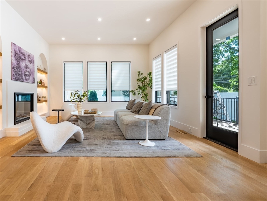 34 West Street, Unit B Newton, MA 02458 - Photo 6 of 17 a living room with furniture and a large window