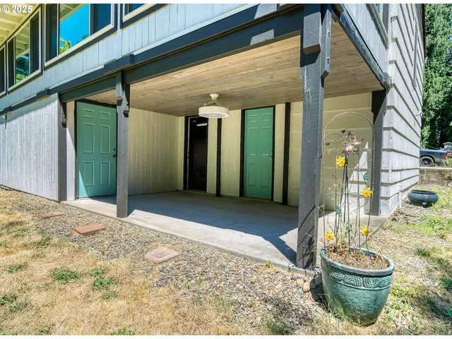 a view of a porch with wooden floor