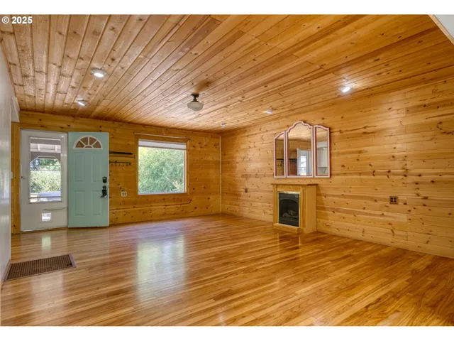 a view of a livingroom with wooden floor