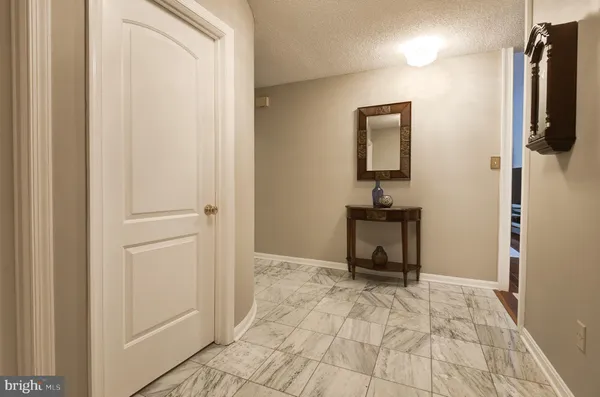 a view of a hallway with workspace