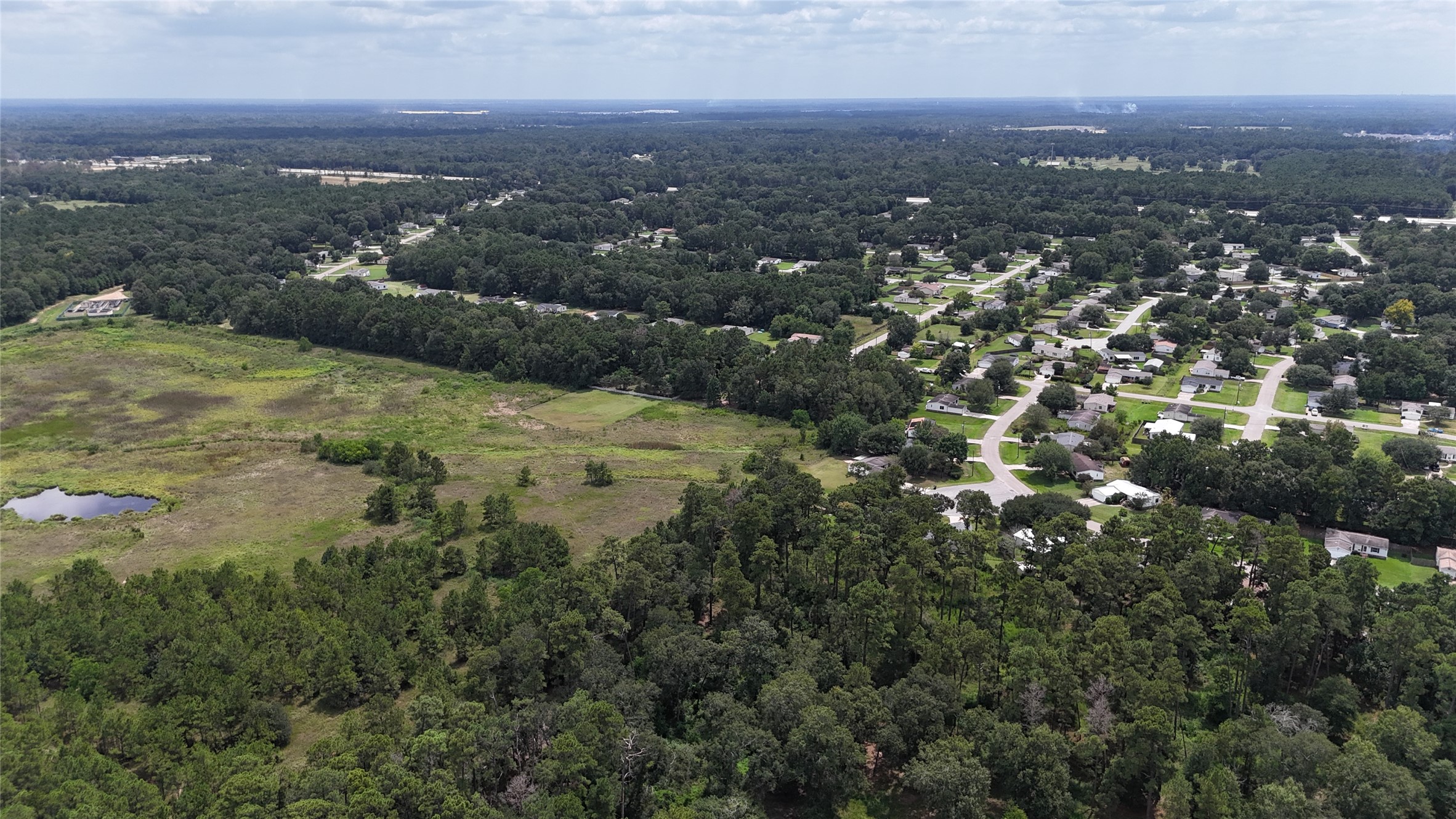 15455 Sharon Lane Conroe, TX 77302 - Photo 2 of 9 a view of city and mountain