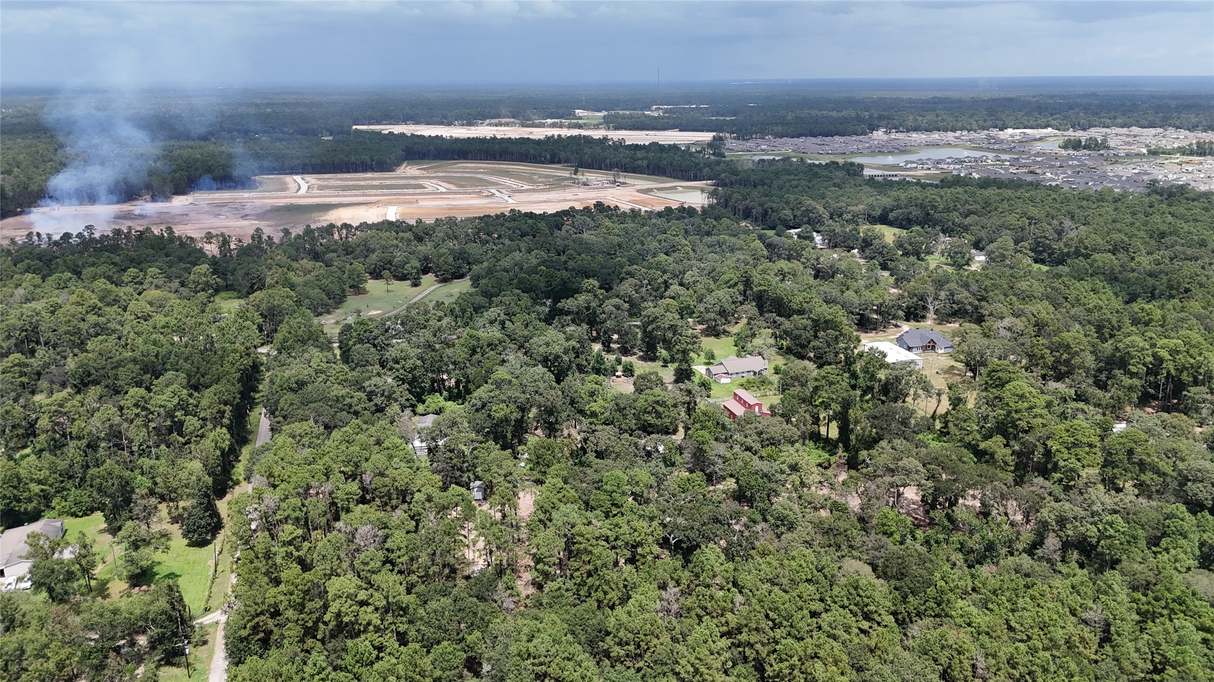 15455 Sharon Lane Conroe, TX 77302 - Photo 4 of 9 a view of a lake and mountain