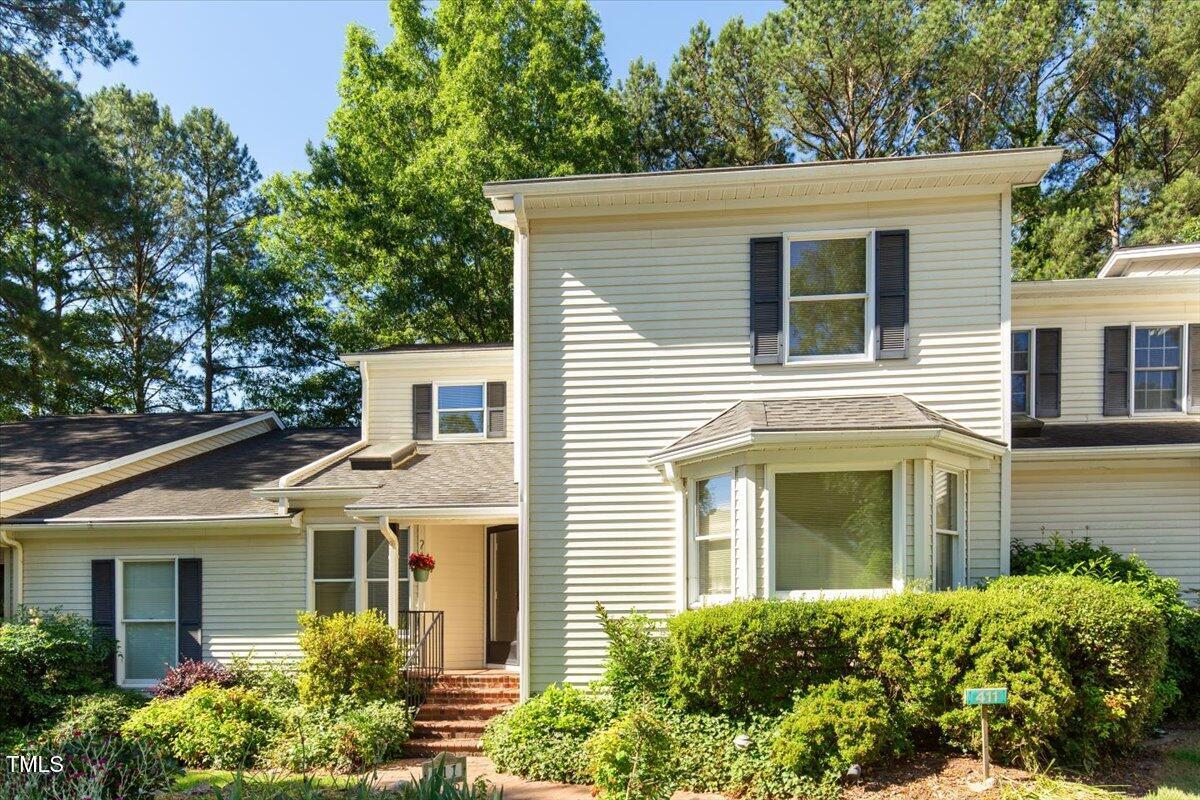 411 Brampton Close Pittsboro, NC 27312 - Photo 2 of 71 front view of a house with a yard