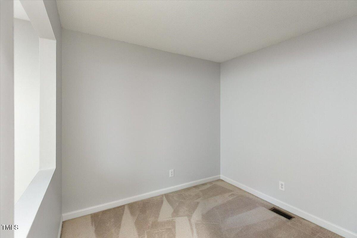 411 Brampton Close Pittsboro, NC 27312 - Photo 30 of 71 a view of an empty room