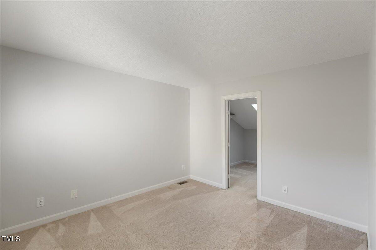 411 Brampton Close Pittsboro, NC 27312 - Photo 32 of 71 a view of an empty room