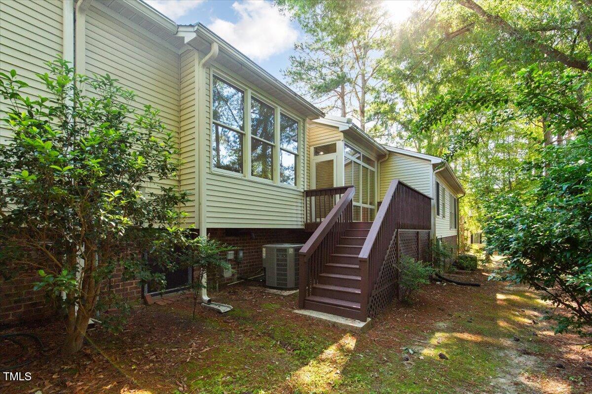 411 Brampton Close Pittsboro, NC 27312 - Photo 43 of 71 a view of a house with a yard