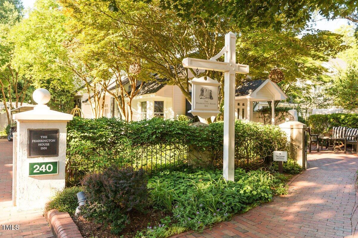 411 Brampton Close Pittsboro, NC 27312 - Photo 59 of 71 a front view of a multi story residential apartment building