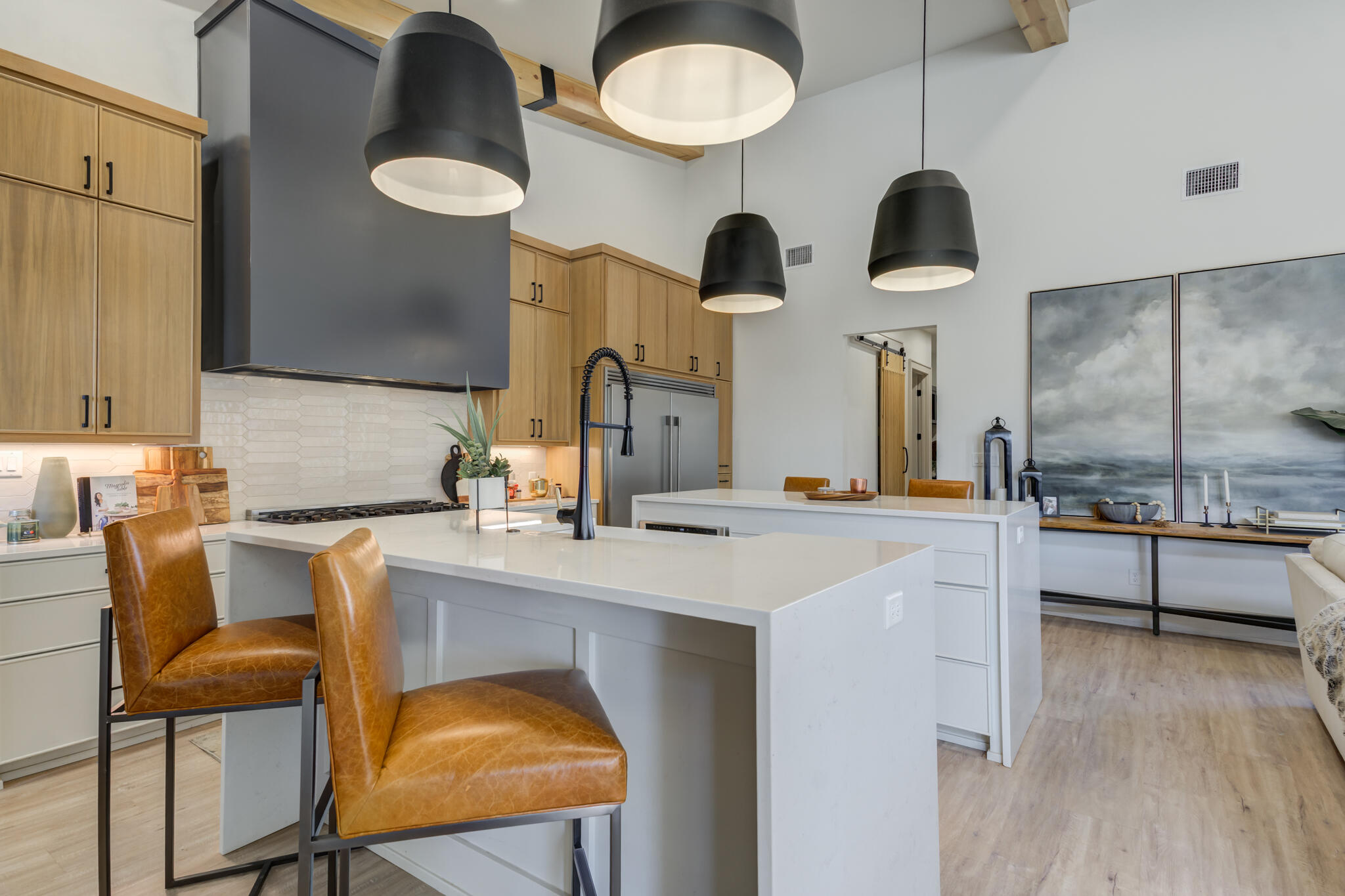3940 148th Street Lubbock, TX 79423 - Photo 21 of 92 a kitchen with cabinets a sink and chairs
