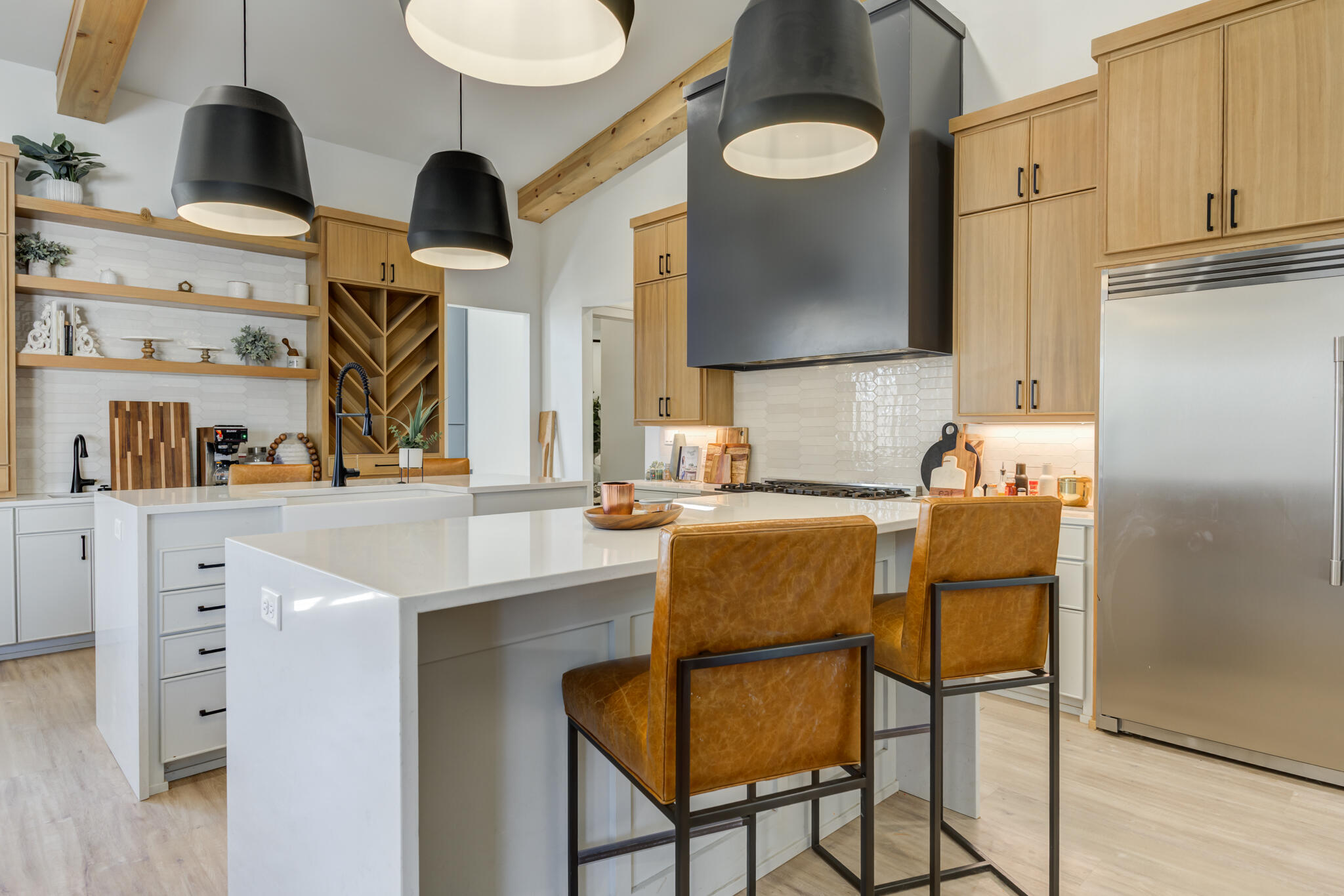 3940 148th Street Lubbock, TX 79423 - Photo 29 of 92 a kitchen with a sink cabinets and appliances