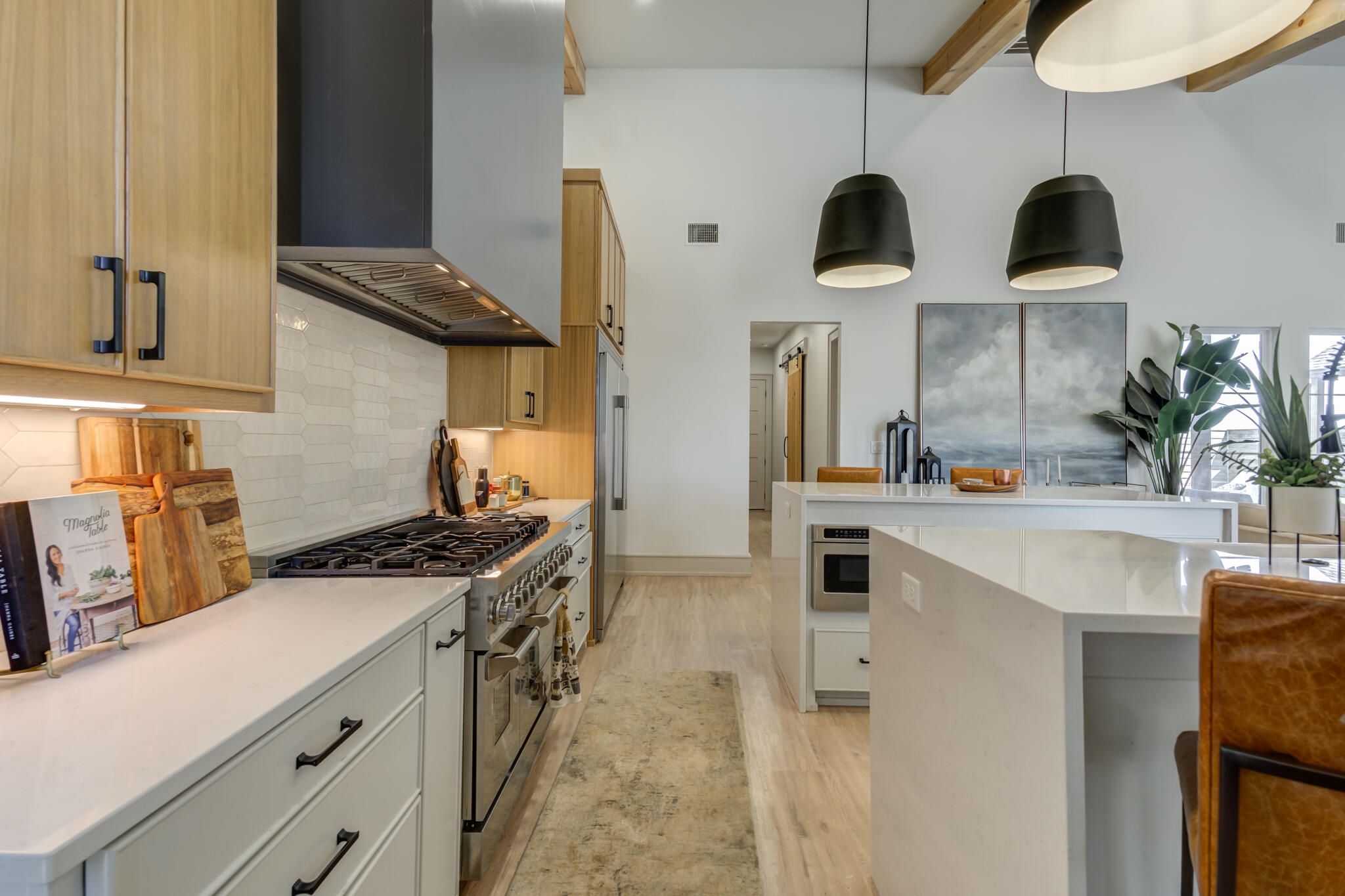 3940 148th Street Lubbock, TX 79423 - Photo 31 of 92 a kitchen with stainless steel appliances granite countertop a stove a sink and a refrigerator