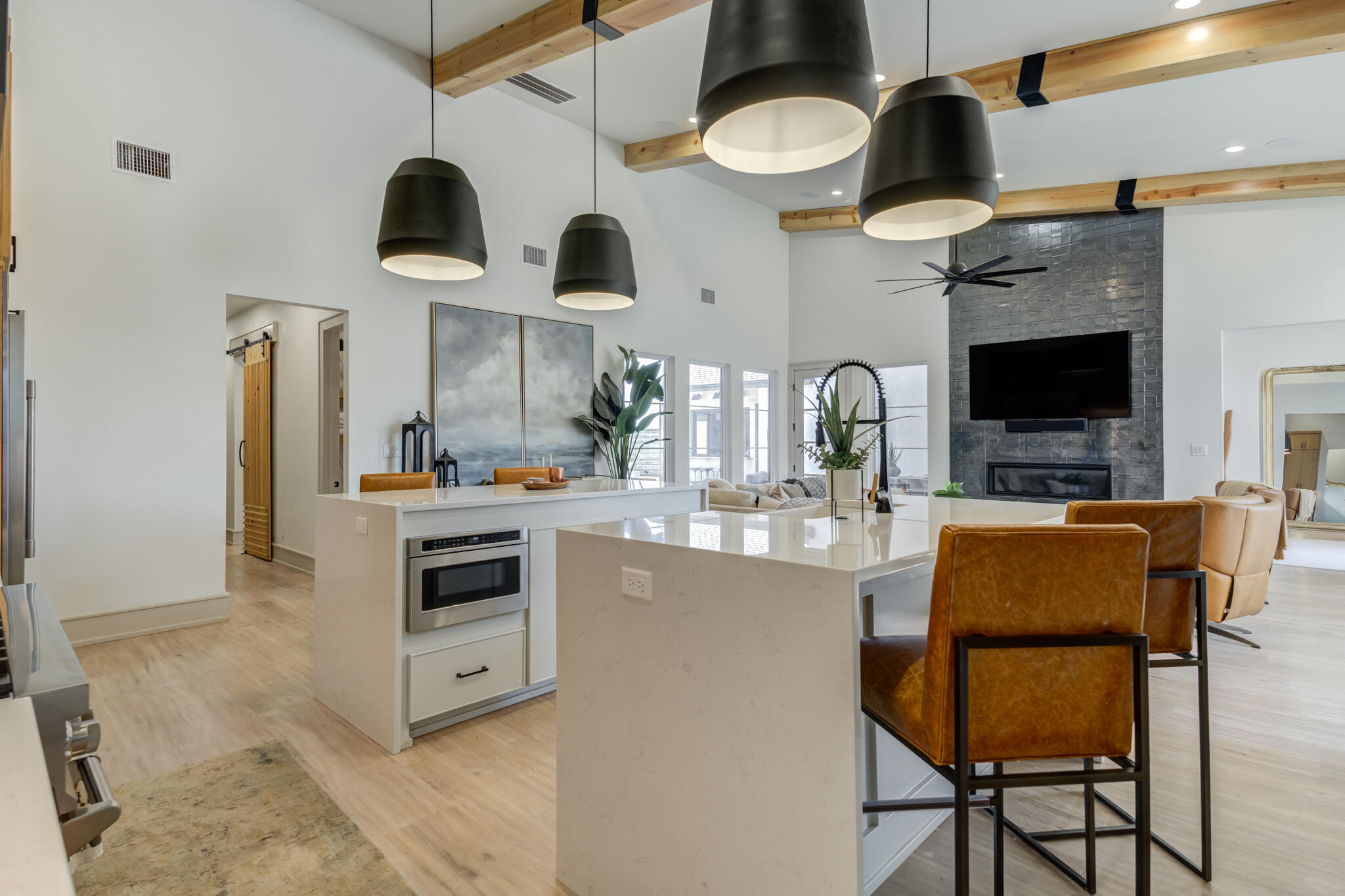 3940 148th Street Lubbock, TX 79423 - Photo 32 of 92 a kitchen with cabinets and chairs