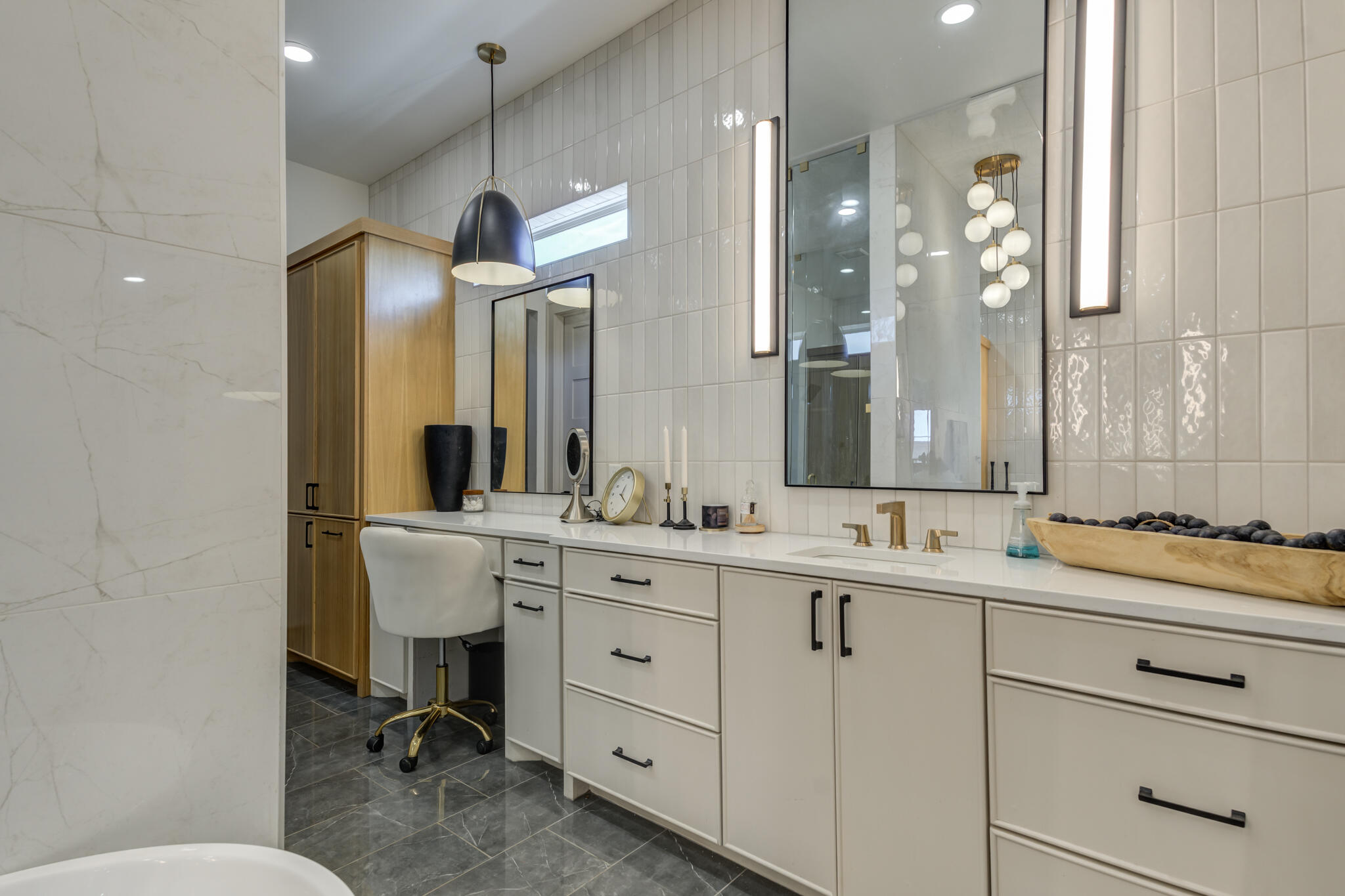 3940 148th Street Lubbock, TX 79423 - Photo 46 of 92 a bathroom with a sink and a mirror