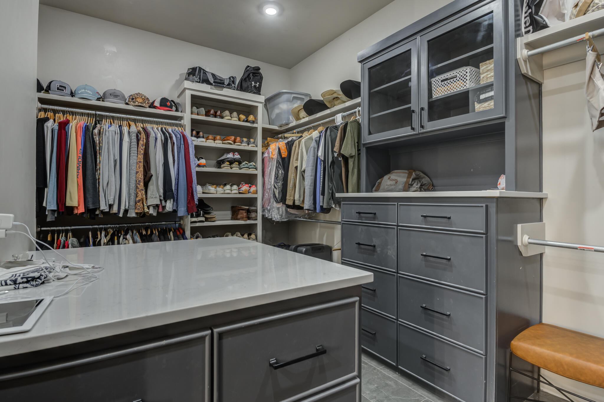 3940 148th Street Lubbock, TX 79423 - Photo 49 of 92 a view of walk in closet with clothes and shoes