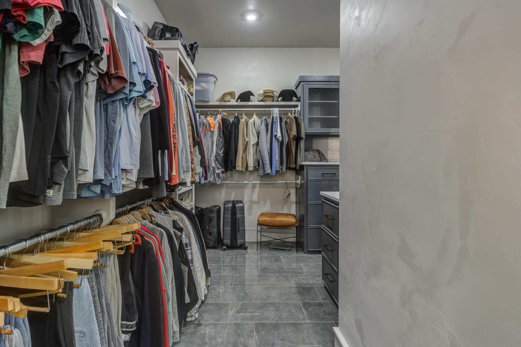 3940 148th Street Lubbock, TX 79423 - Photo 50 of 92 a view of walk in closet with clothes and shoes