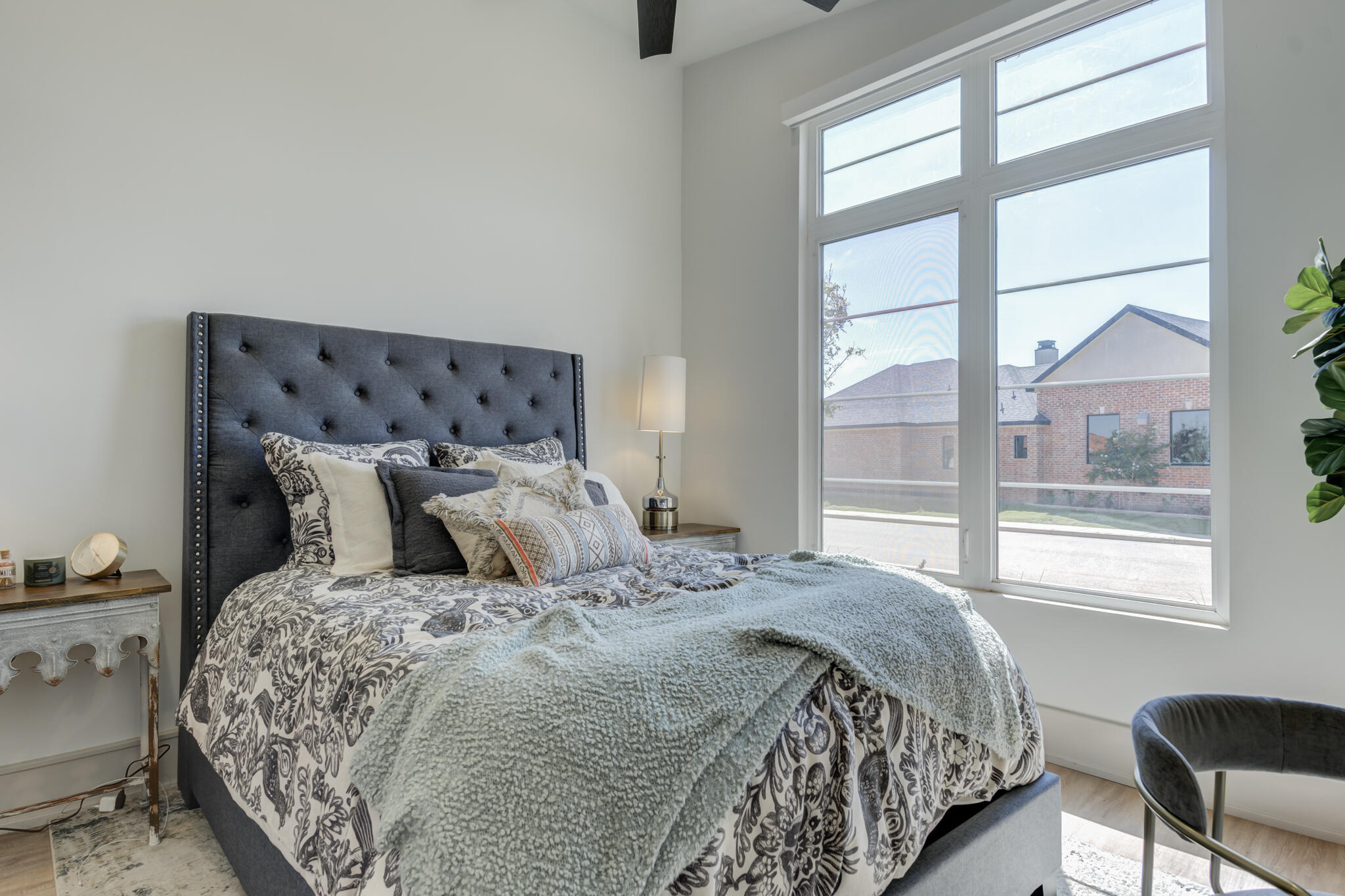 3940 148th Street Lubbock, TX 79423 - Photo 54 of 92 a bedroom with a large bed and a window