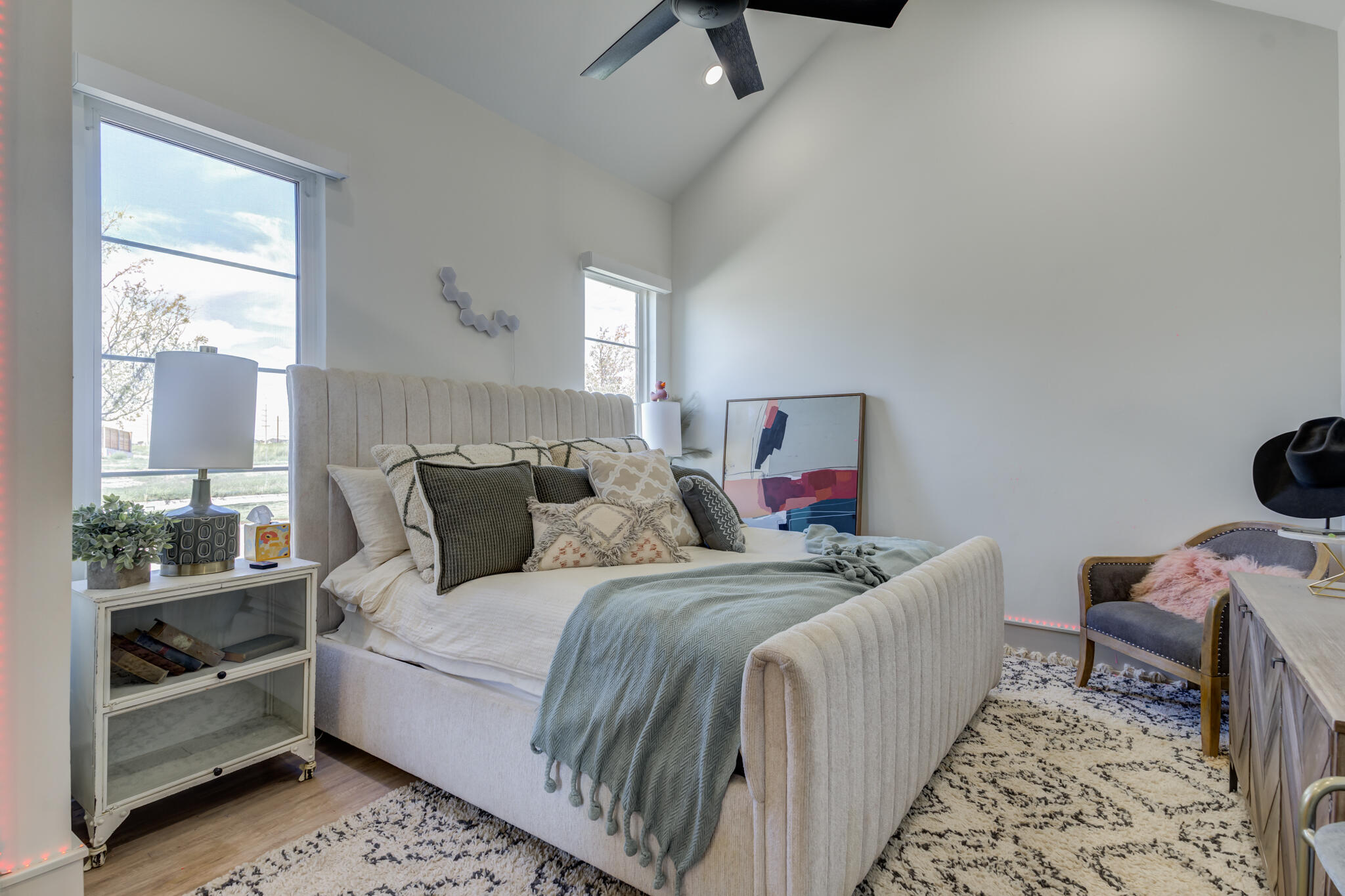 3940 148th Street Lubbock, TX 79423 - Photo 57 of 92 a bedroom with a bed and wooden floor
