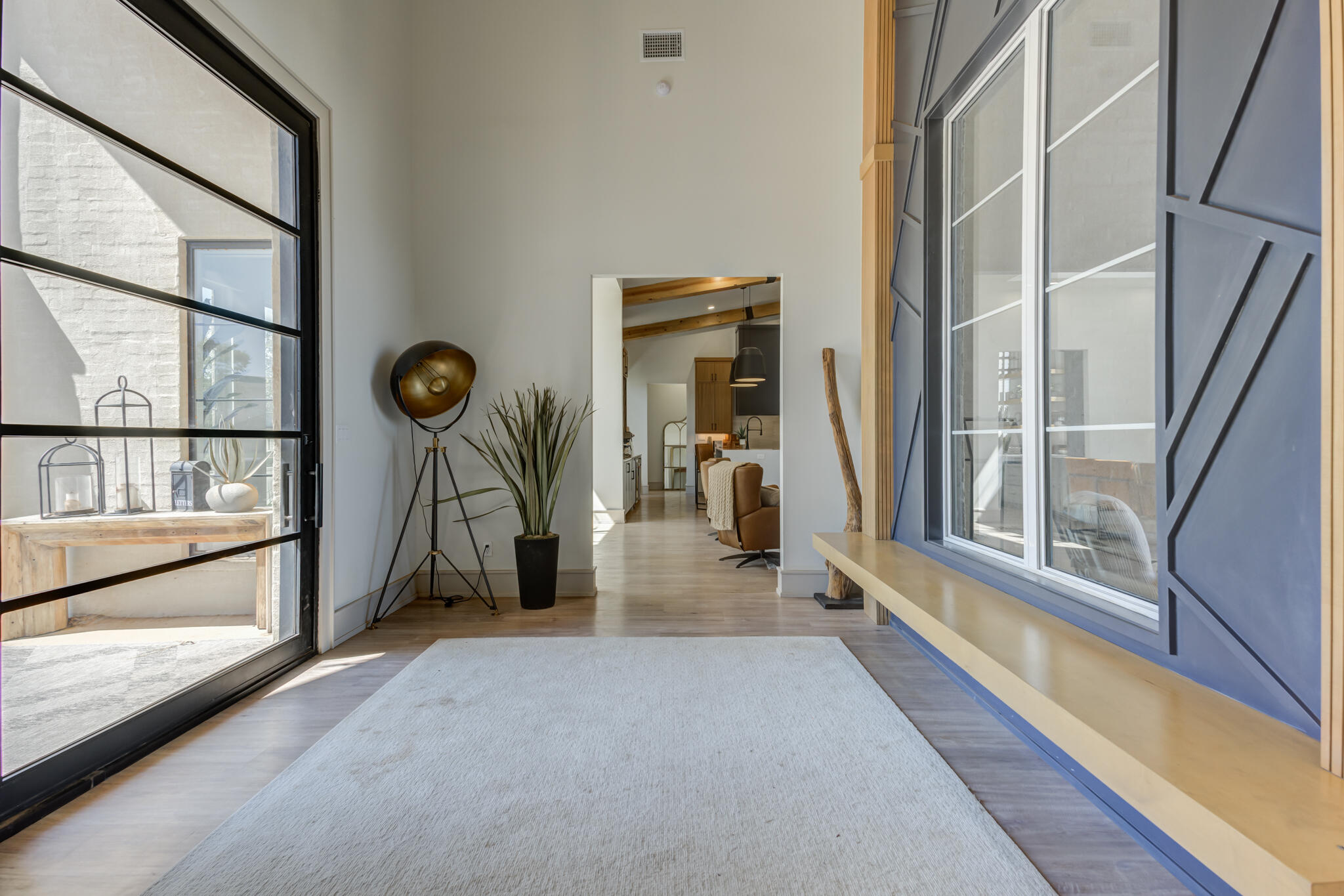3940 148th Street Lubbock, TX 79423 - Photo 6 of 92 a view of a hallway with wooden floor and windows